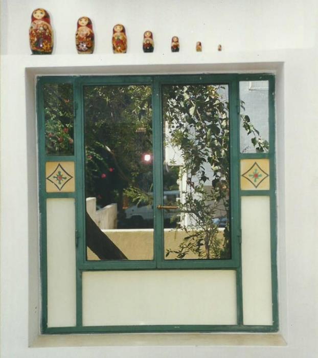 חלון בלגי מעוצב - רוםסן - אומנות הפרופיל הבלגי
