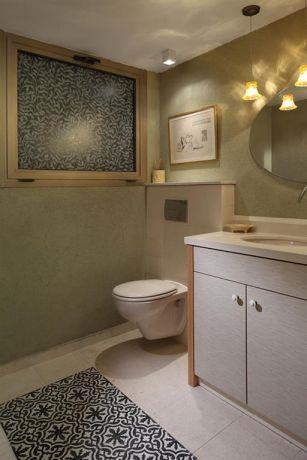 חדר אמבט מעוצב בסגנון מודרני בדגש על תאורה וחיפוים למראה יוקרתי של חלל האמבט  בעיצוב ותכנון של נגה ארנסון
