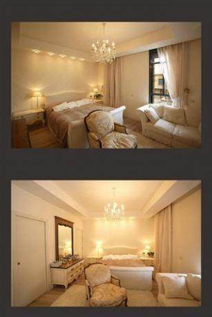 חדר שינה רומנטי-קלאסי בגווני לבן בעיצוב ותכנון של A&E Design