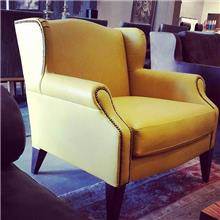 כורסא צהובה מבית זהבי גלרייה לעיצוב
